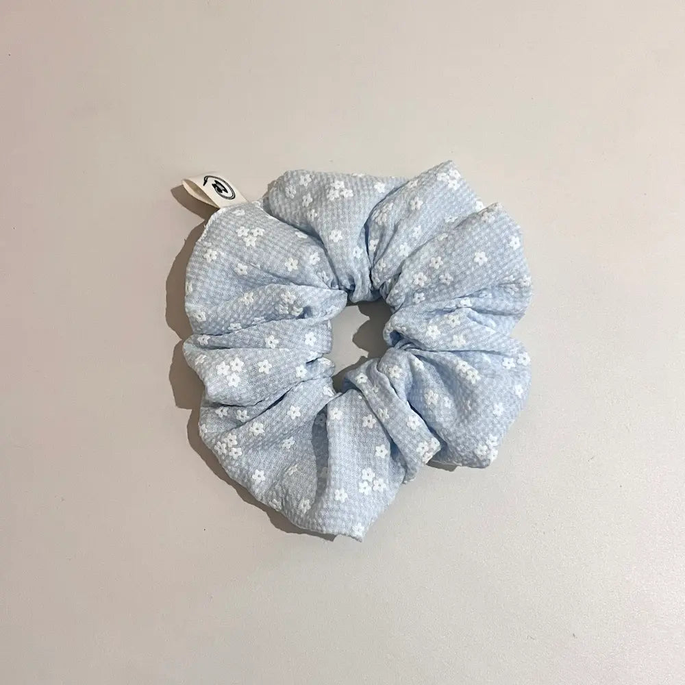 Kang Kang Handmade baby blue scrunchie with white daisy print, handmade fabric hair tie